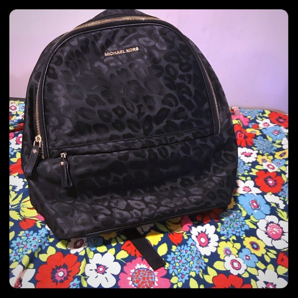 michael kors black cheetah backpack